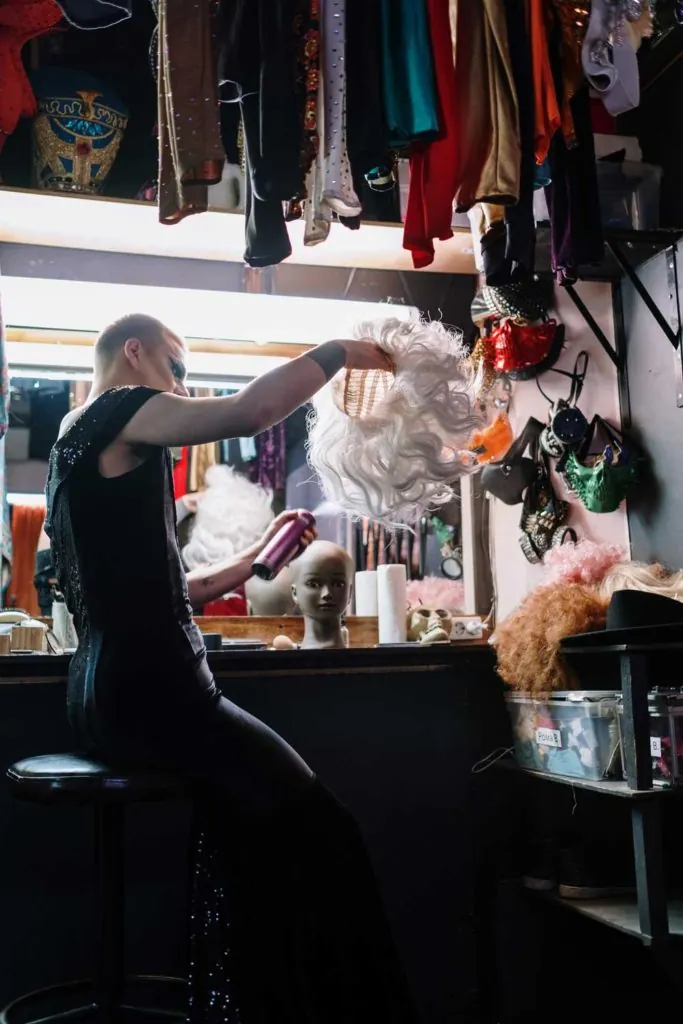 Drag queen preparing for performance 
